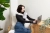 Penguinyoungwomanworkingzoomedout.webp