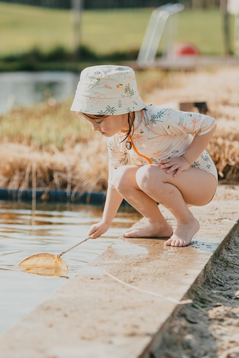 6242dcbaa2f9c2b388e41ca2_Ducksday swimsuit girl orange palmtree (3).jpg